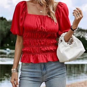 Red/crimson ruched top w/ short puff sleeves. New with tags. Simple and elegant